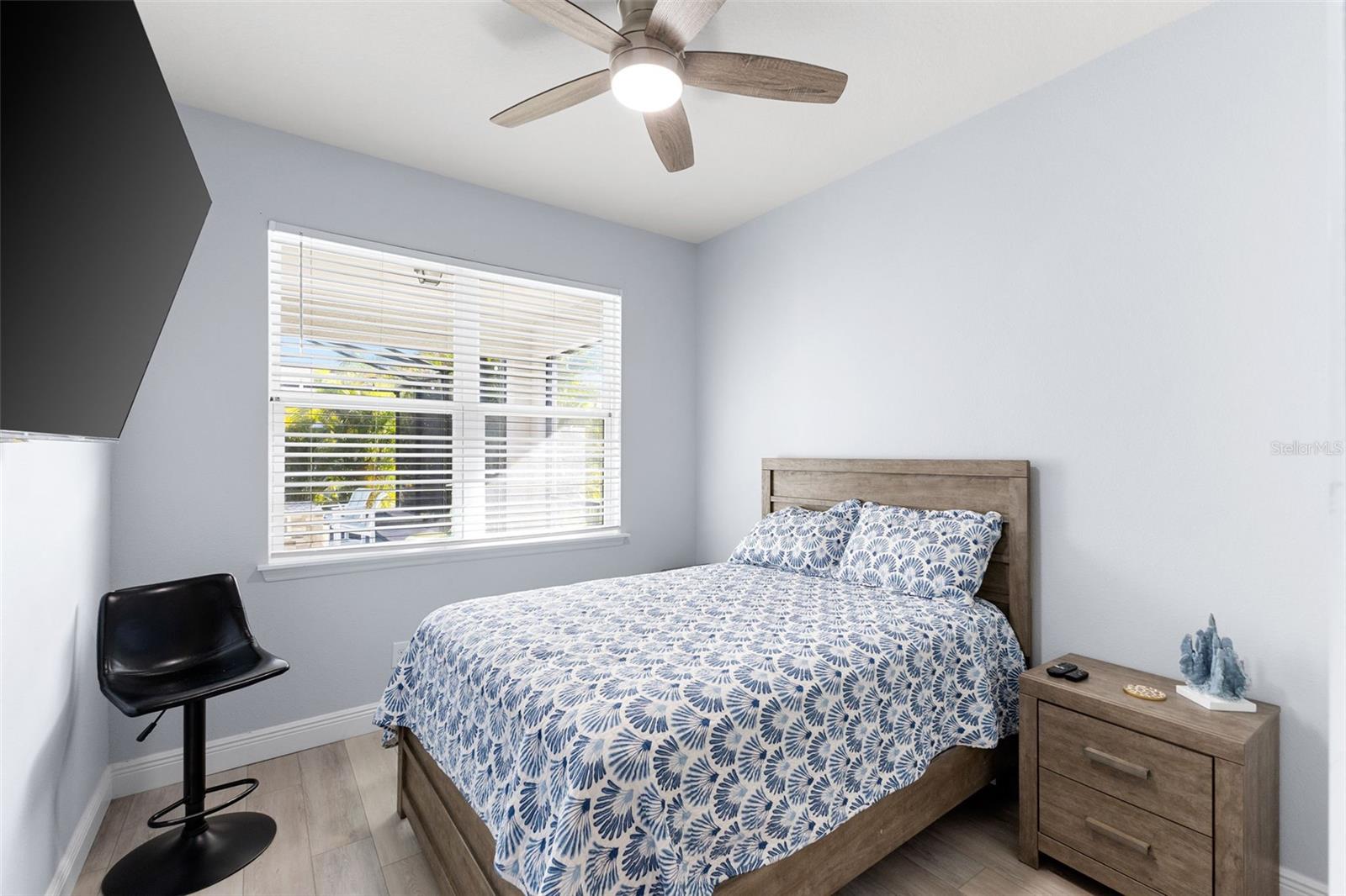 Downstairs 5th bedroom ideal for multi-generational households, guests, or in-law accommodations