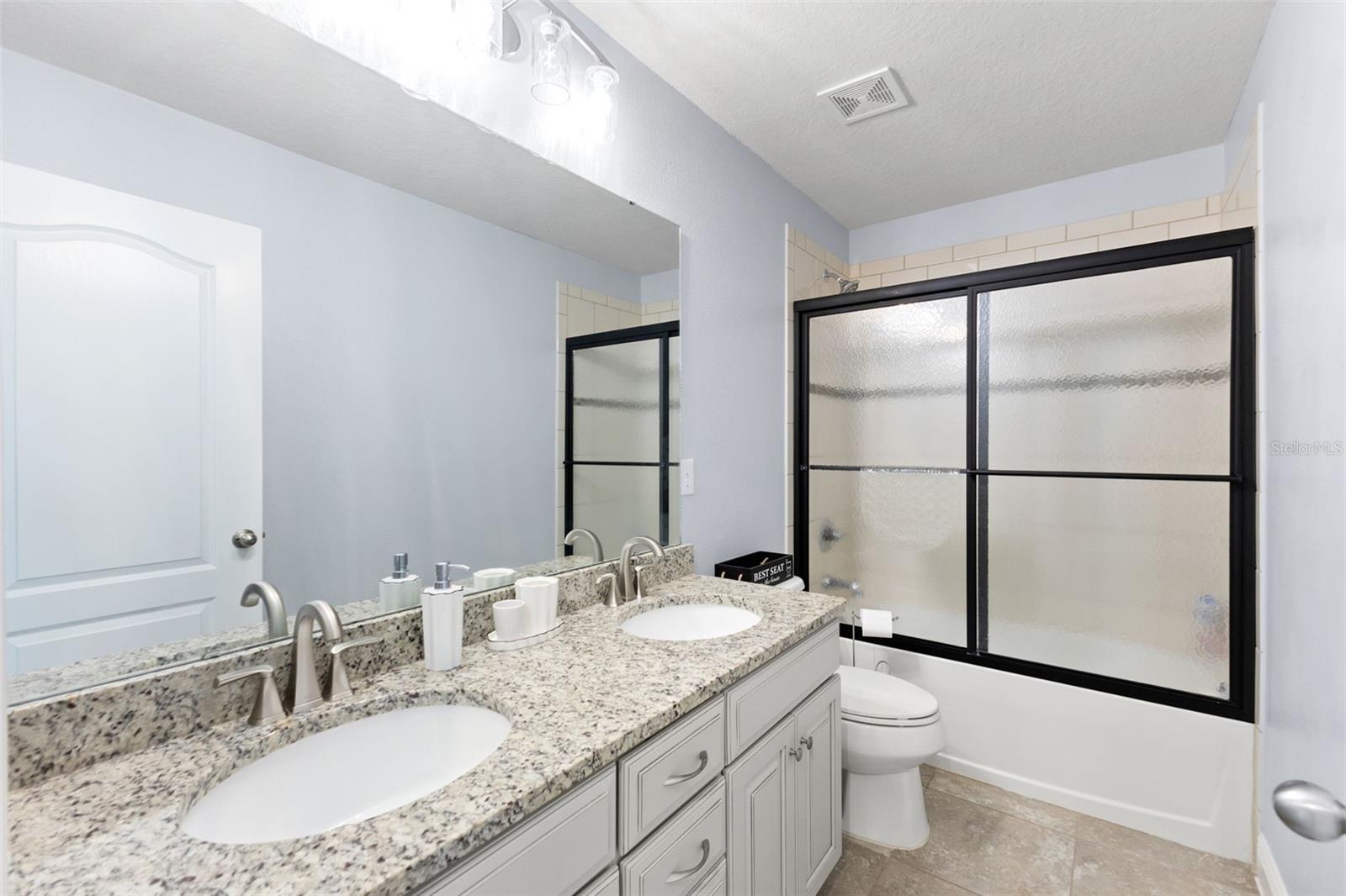 Upstairs 3rd full bathroom with dual sinks