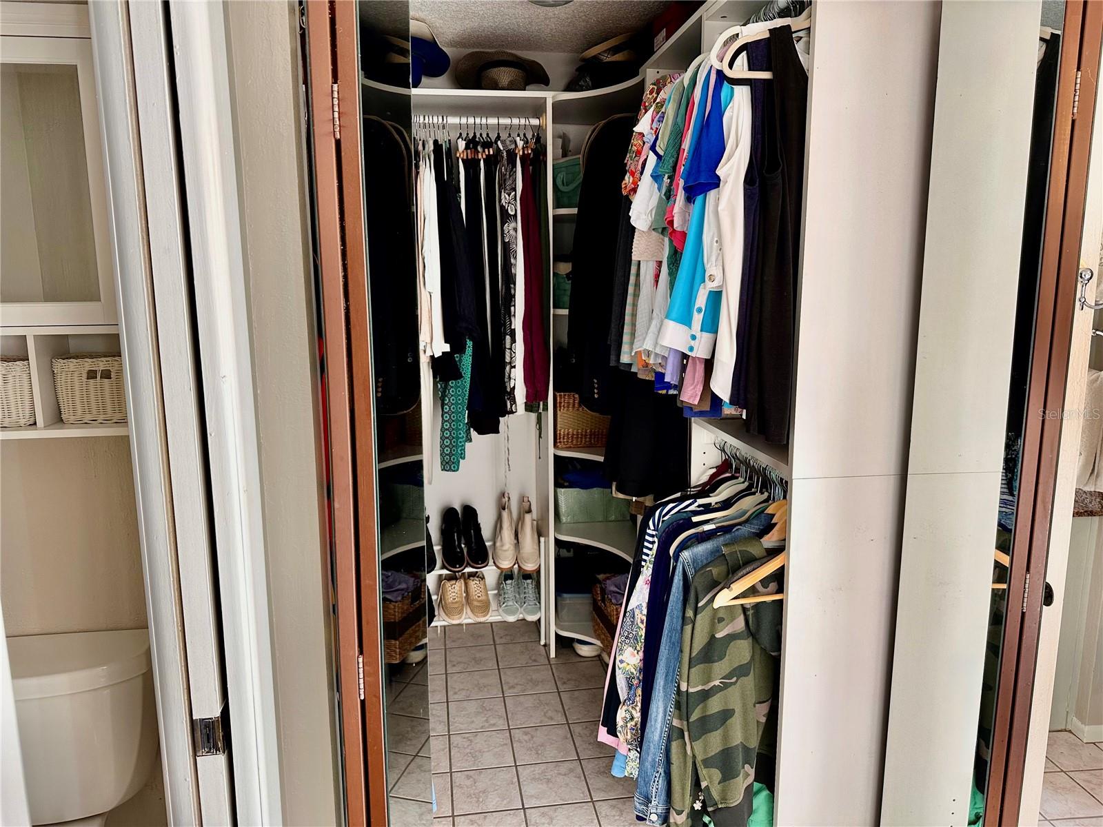 Primary Bath Walk-In Closet with Built In Organizer
