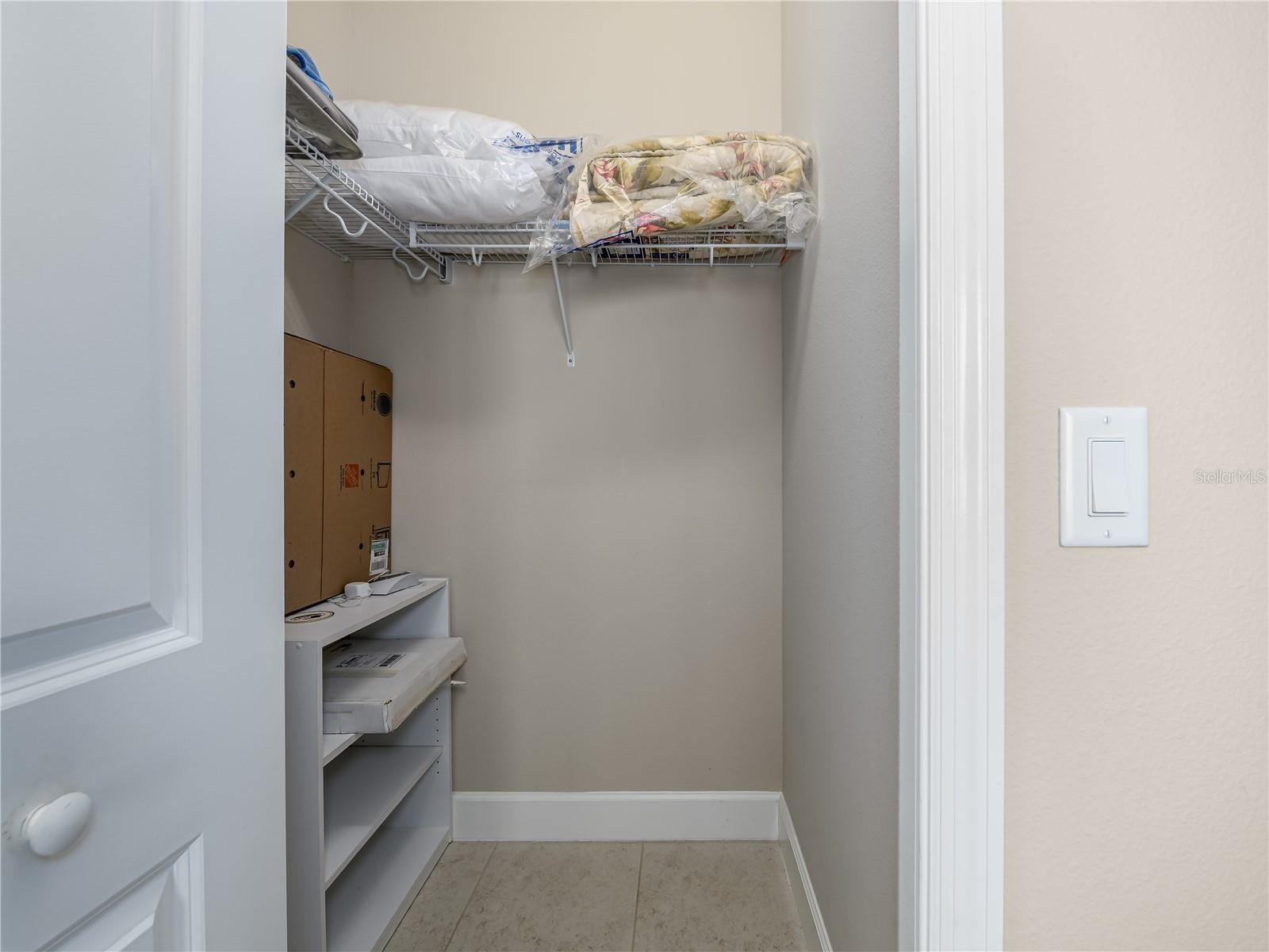 Secondary bedroom walk in closet