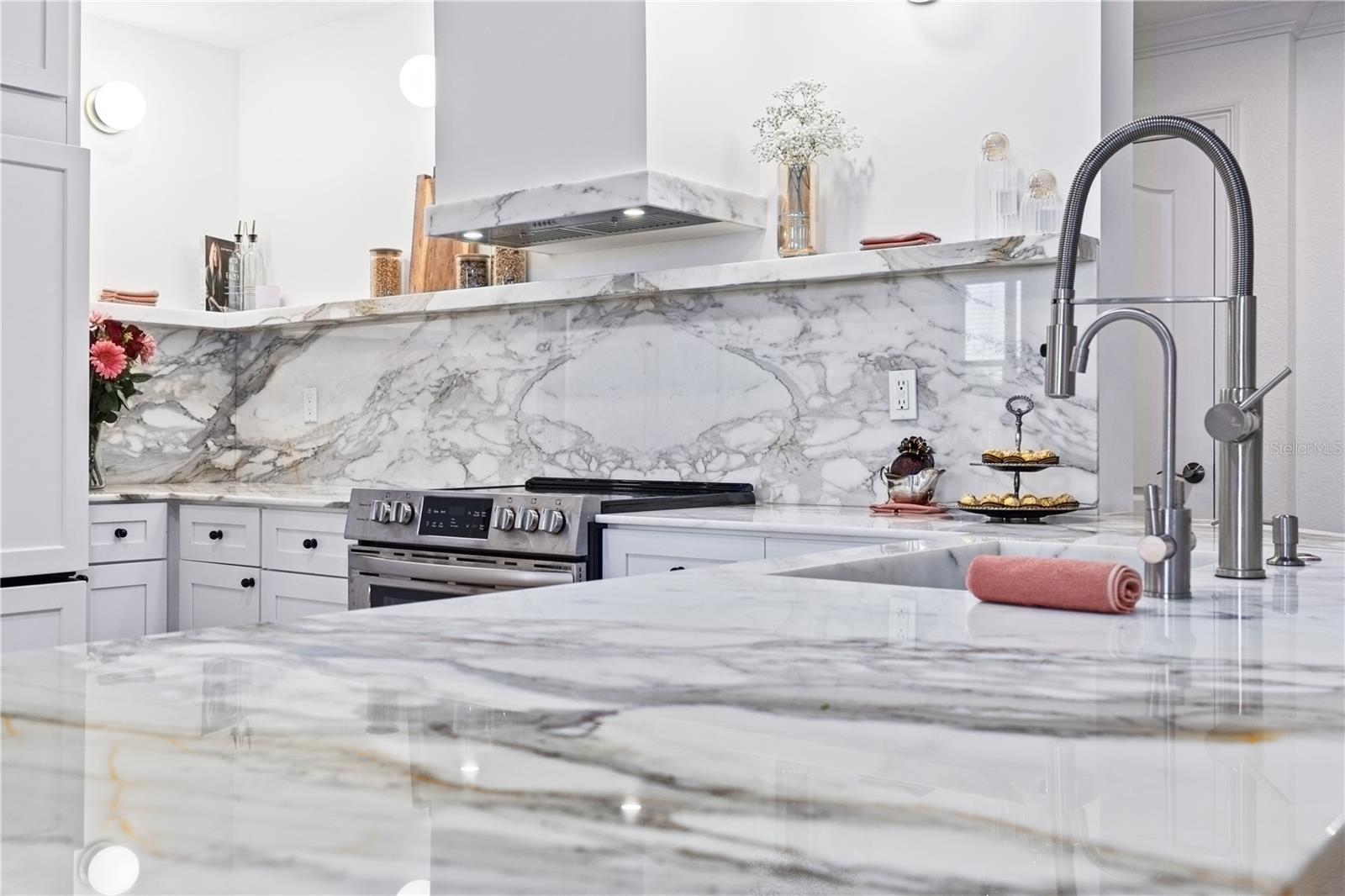 Marble waterfall edge and InstaHot faucet