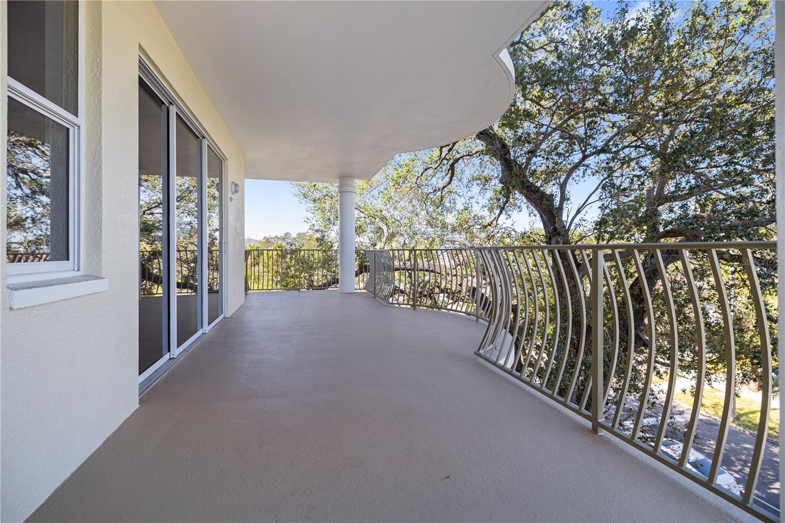 50' balcony wraps around the corner unit on the North and West sides