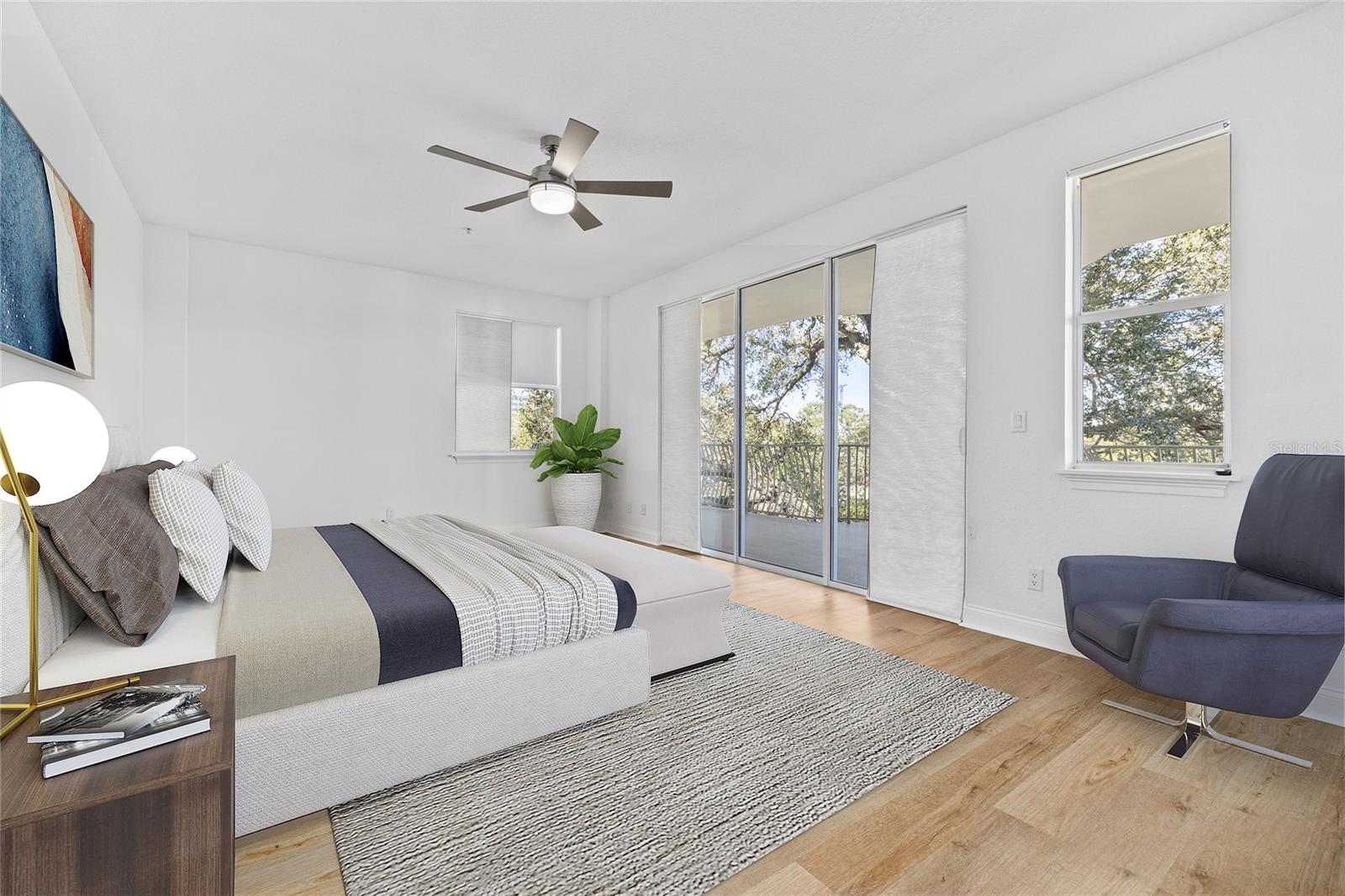 Primary bedroom opens to exterior seating and features reach-in closet