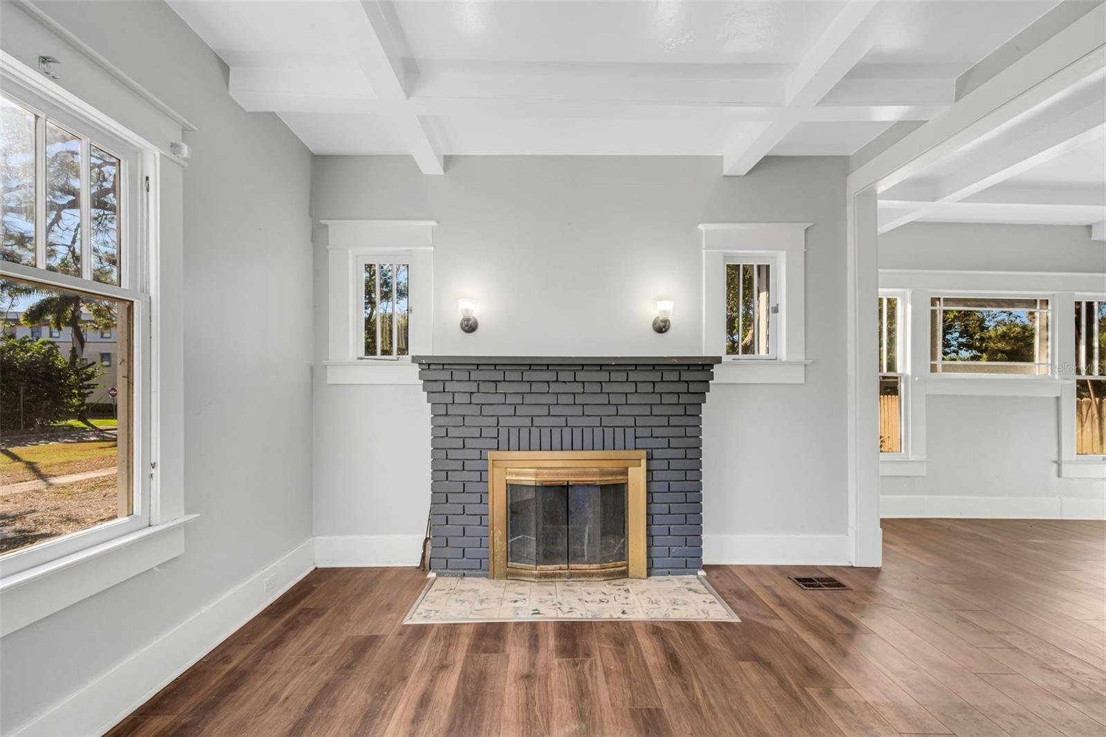 Living Room with Wood Burning Fireplace and Beautiful Ceiling Beams