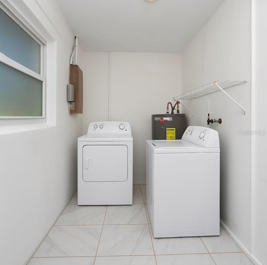 Washer and dryer were added after the photos were taken; image have been enhanced to show the updated setup.
