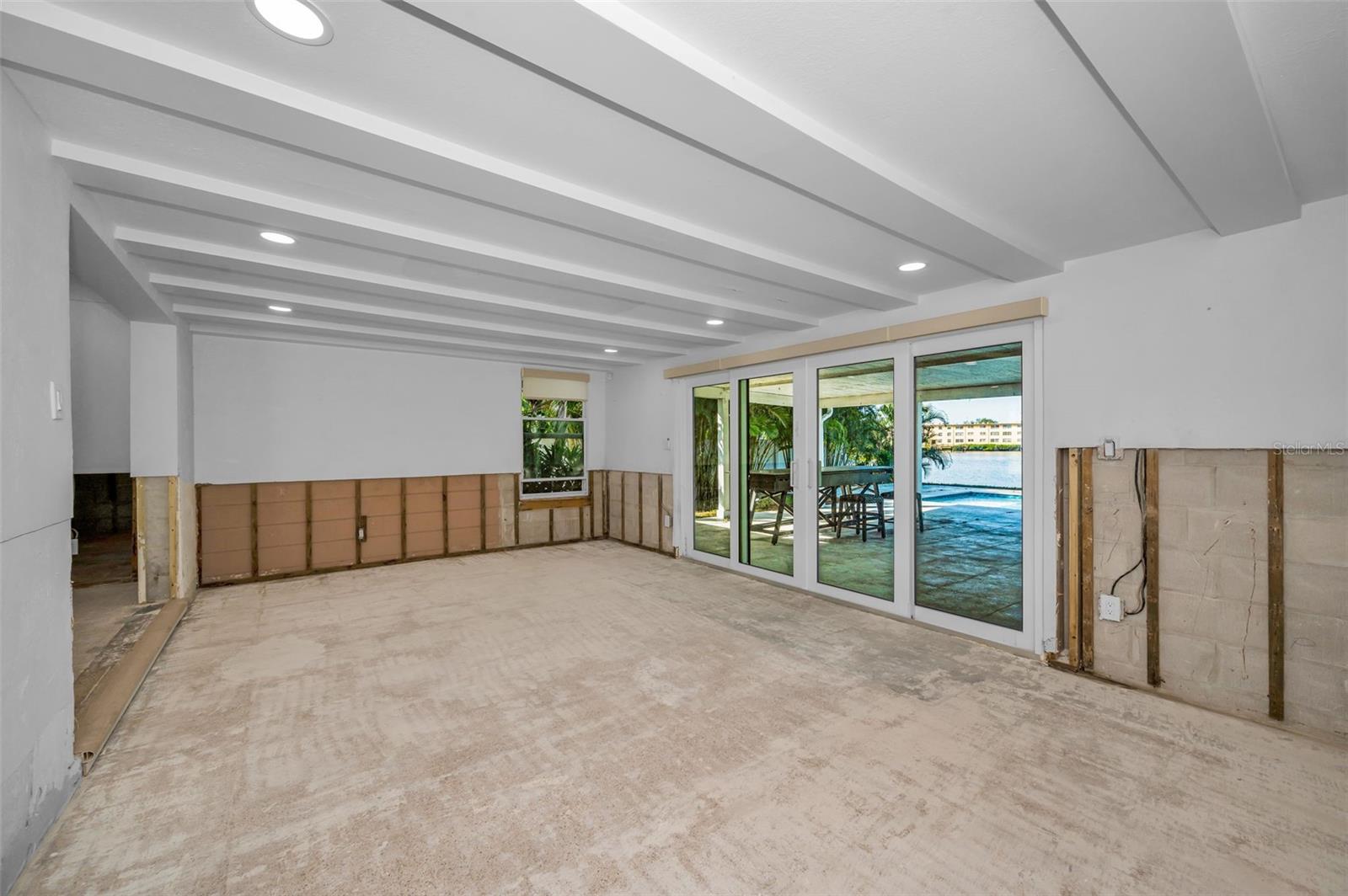 Family Room looing out towards pool/water