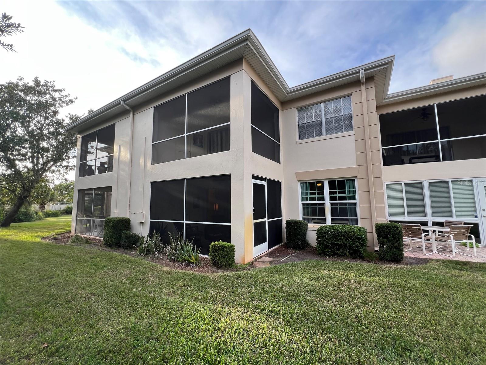 View to lanai from green space