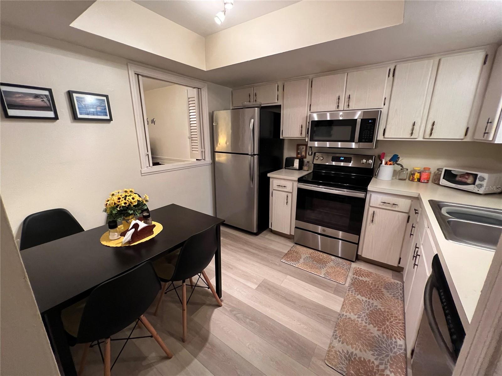 All stainless steel appliances and eat-in space too!