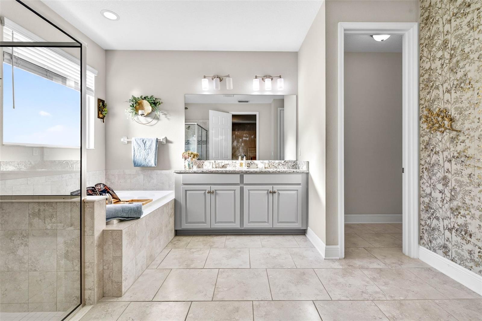 Ensuite Bathroom with soaking tub, walk in shower.