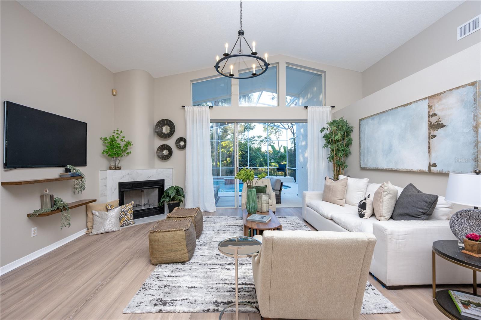 Spacious gathering space with private nature views