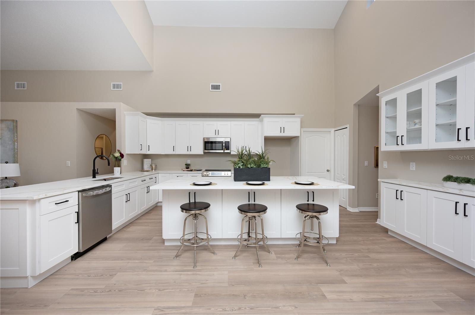 HUGE dream kitchen with dramatic high ceilings