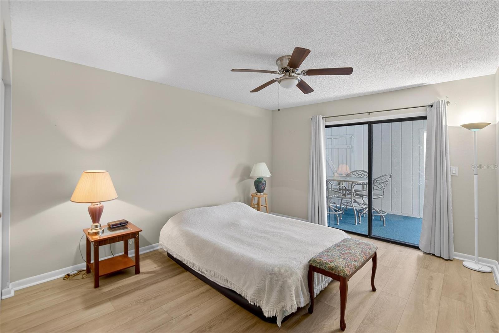 Primary Bedroom w/Lanai Access & Water View