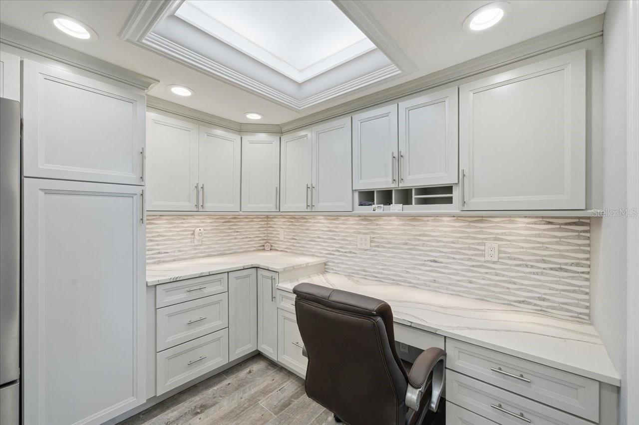 Built in desk with TONS of storage and space to spread out and work!