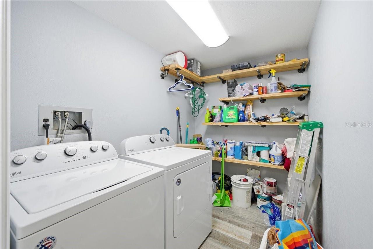 Laundry "MUD" room with shelving