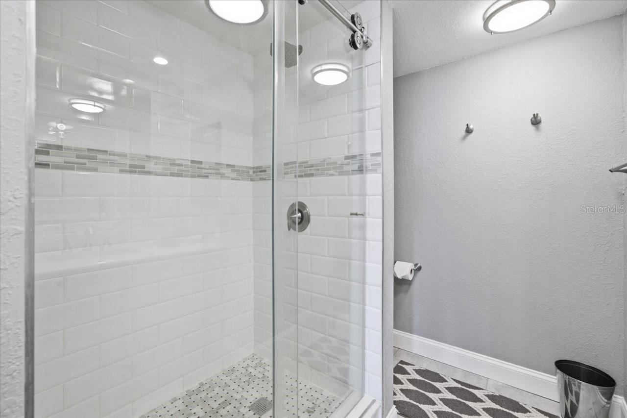 Primary bath with walk in updated shower