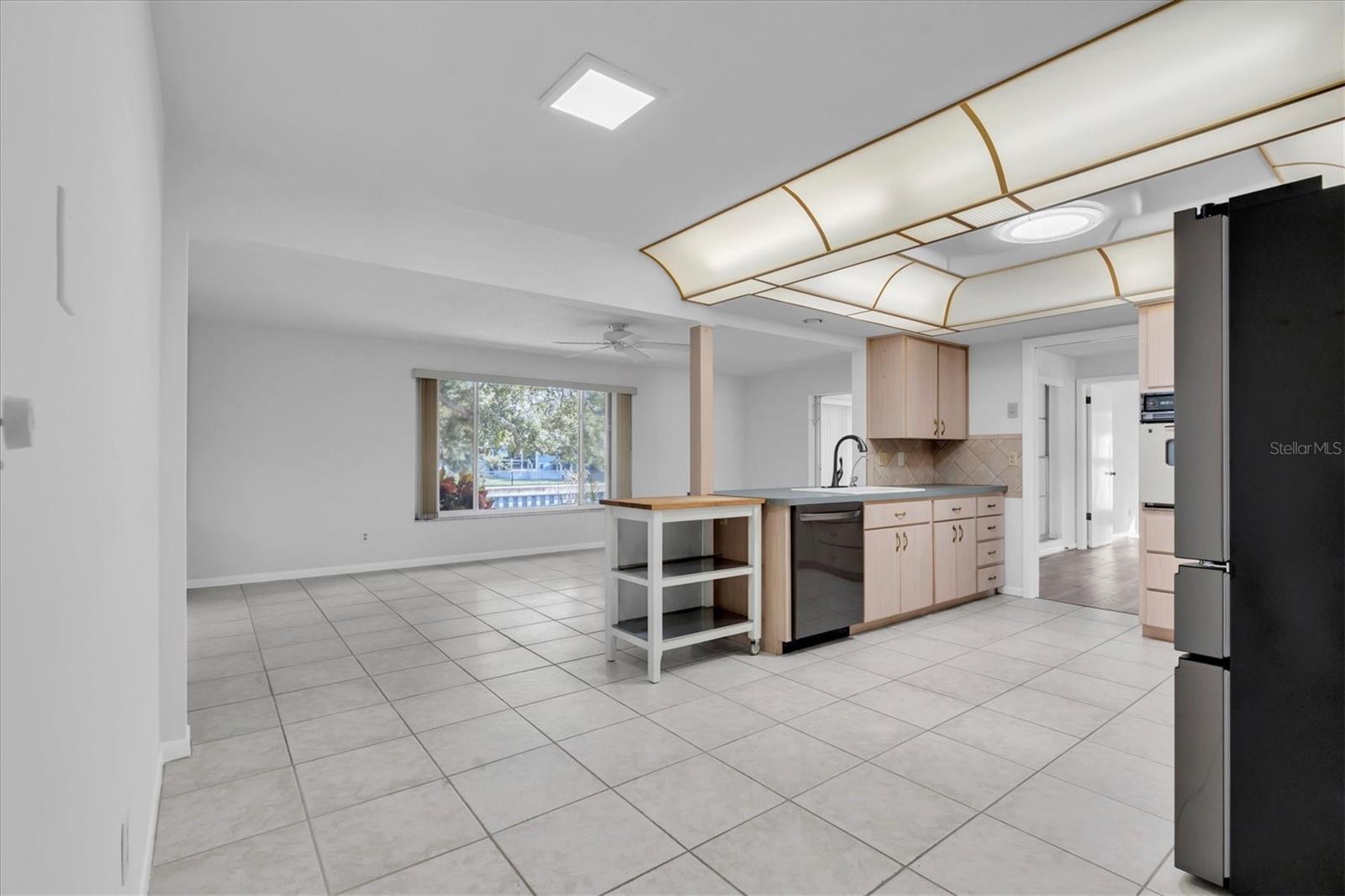 Breakfast area looking into kitchen and family room