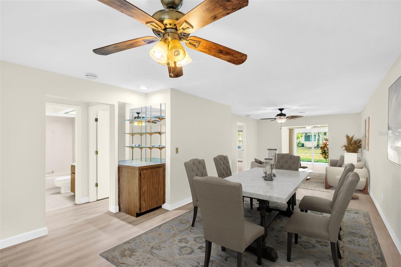 Laundry, hall bath and 2nd bedroom privately located at front of home~