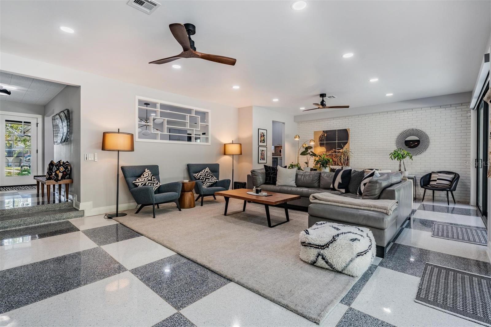 Tall ceilings with designer fans