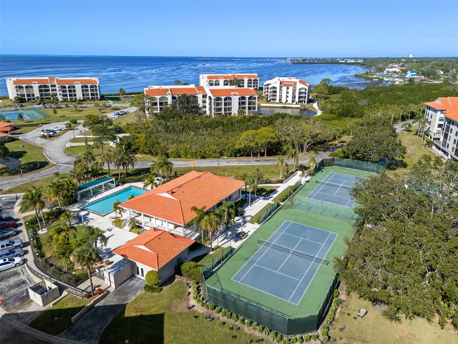 TENNIS COURTS, POOL AND CLUBHOUSE