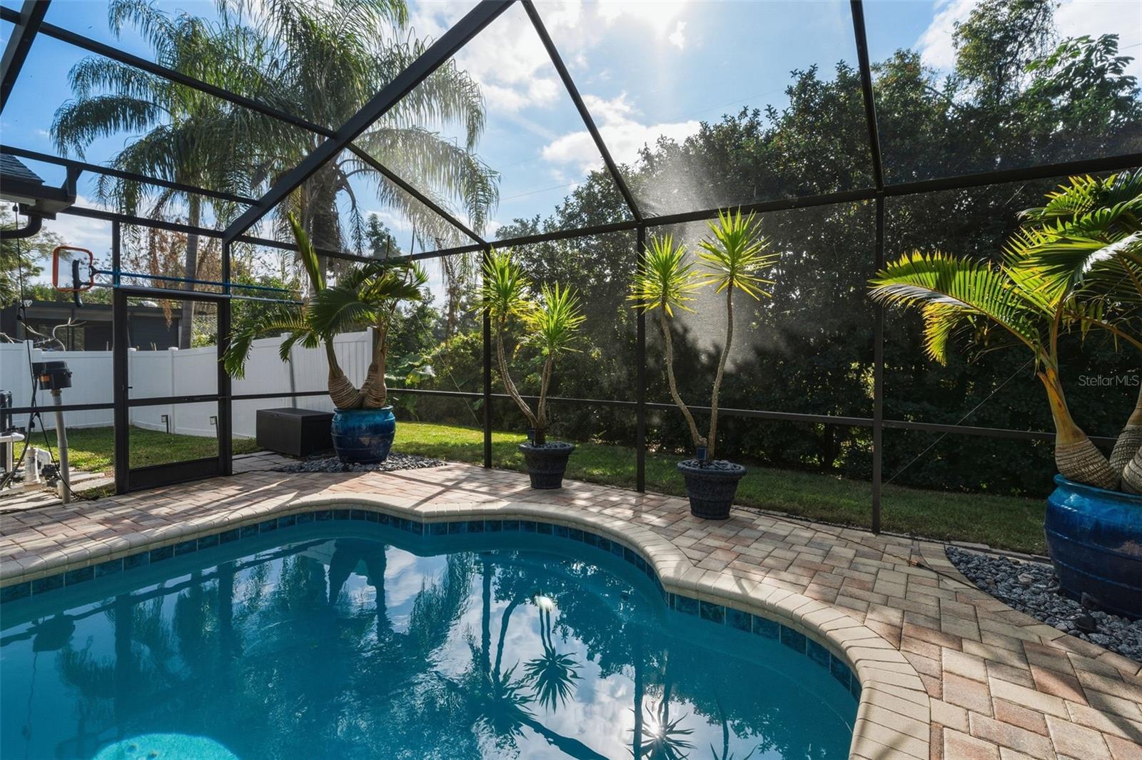 Fenced area off the pool is perfect for pets