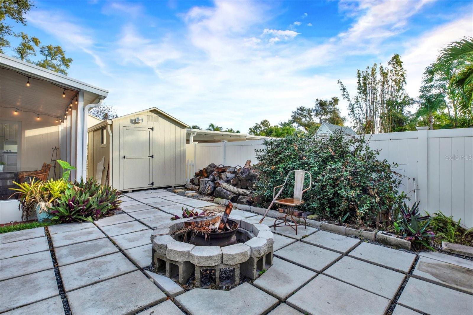 Spacious Backyard with Fire Pit, Detached Office and Screened-In Patio