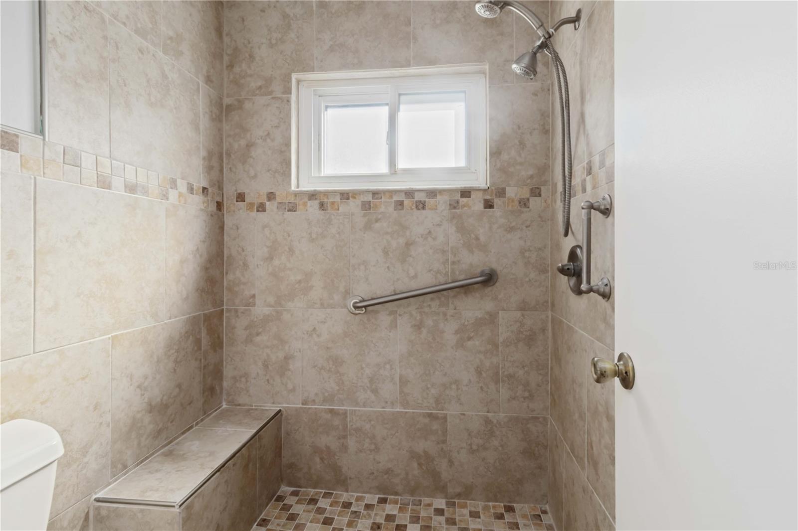 Primary bathroom shower.