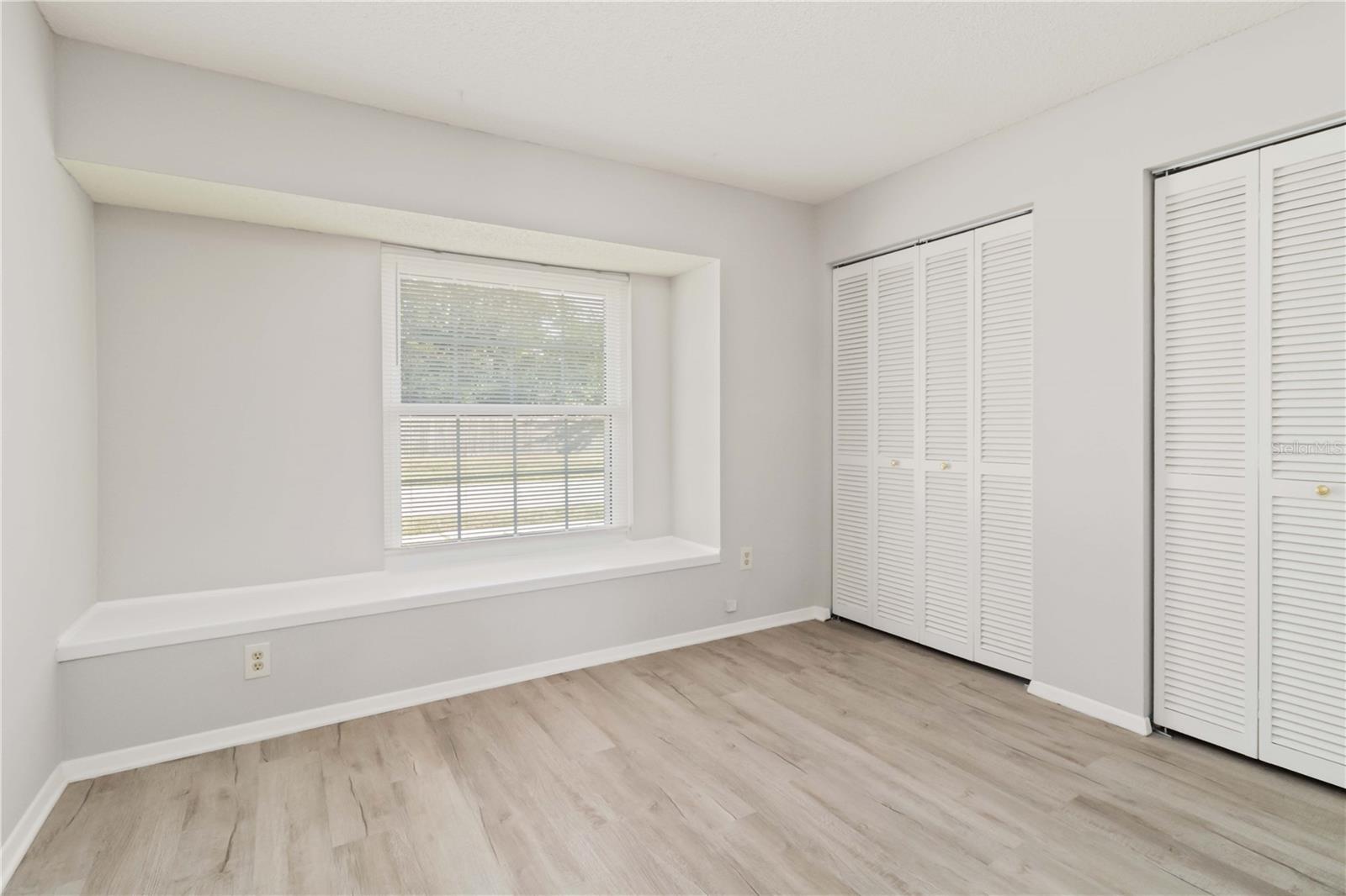 Bedroom 2 with double closets.