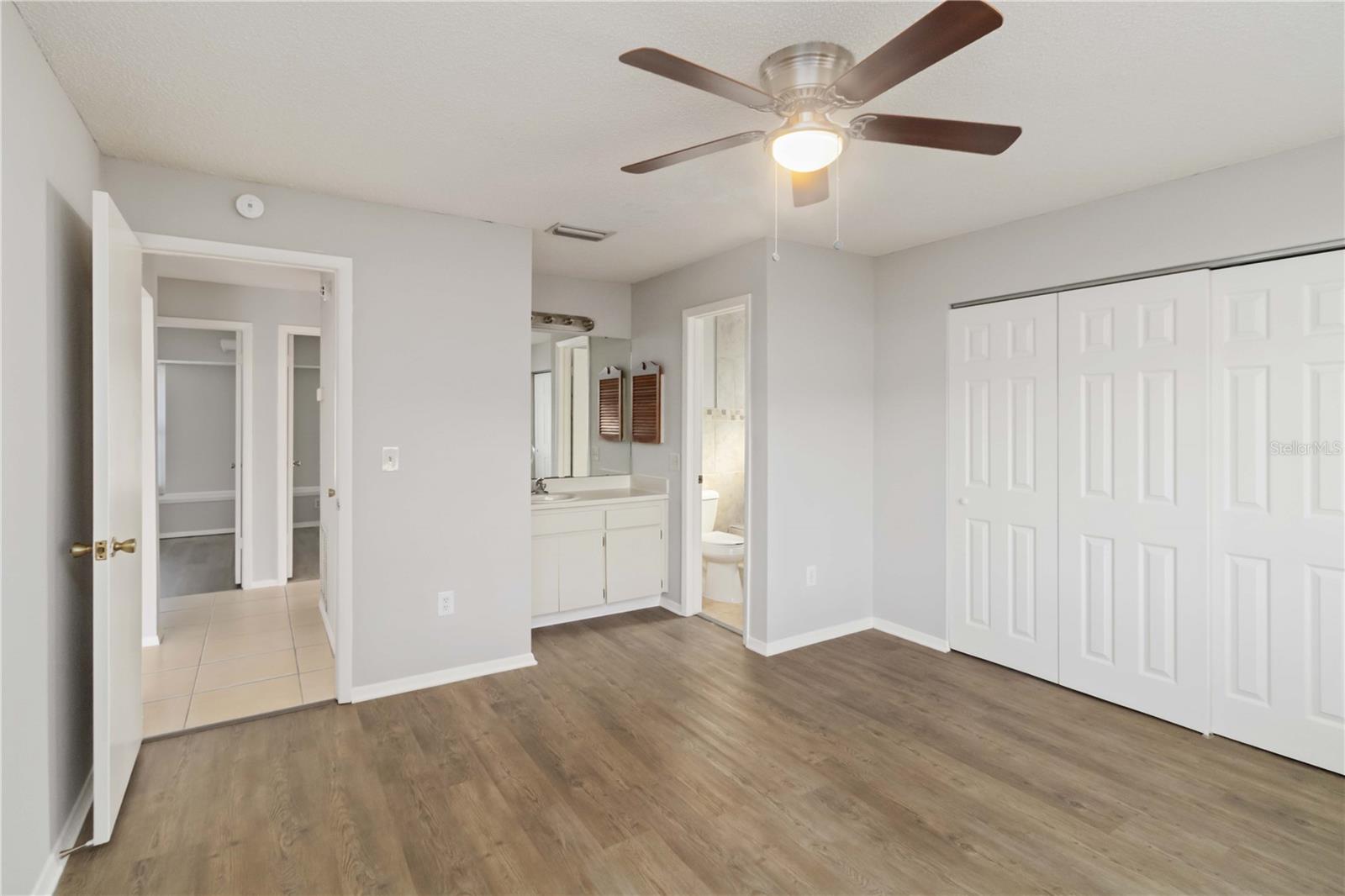 Primary bedroom w/ ensuite.