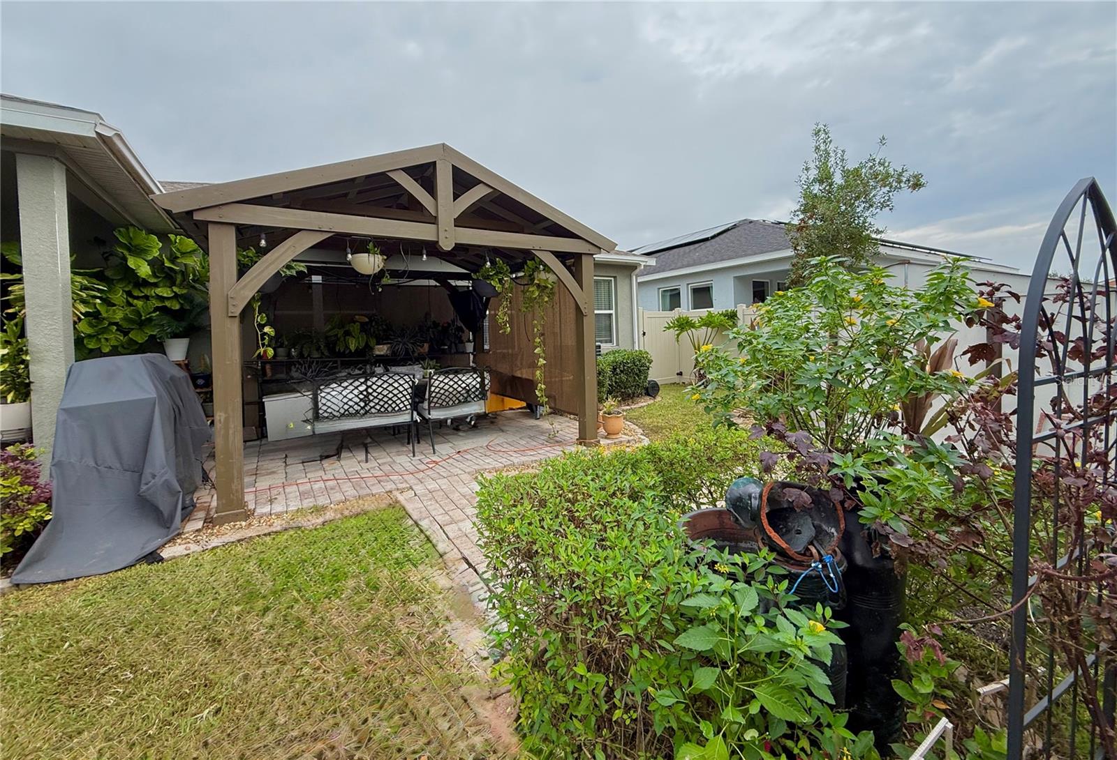 Built in Pergola with paved area.