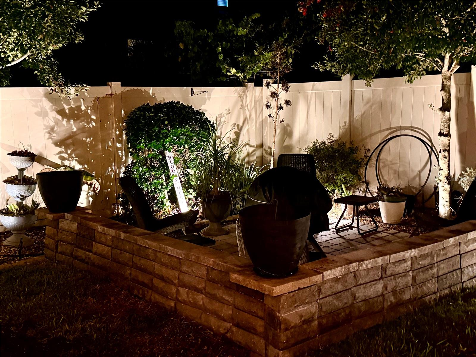Fire Pit area with night lights.