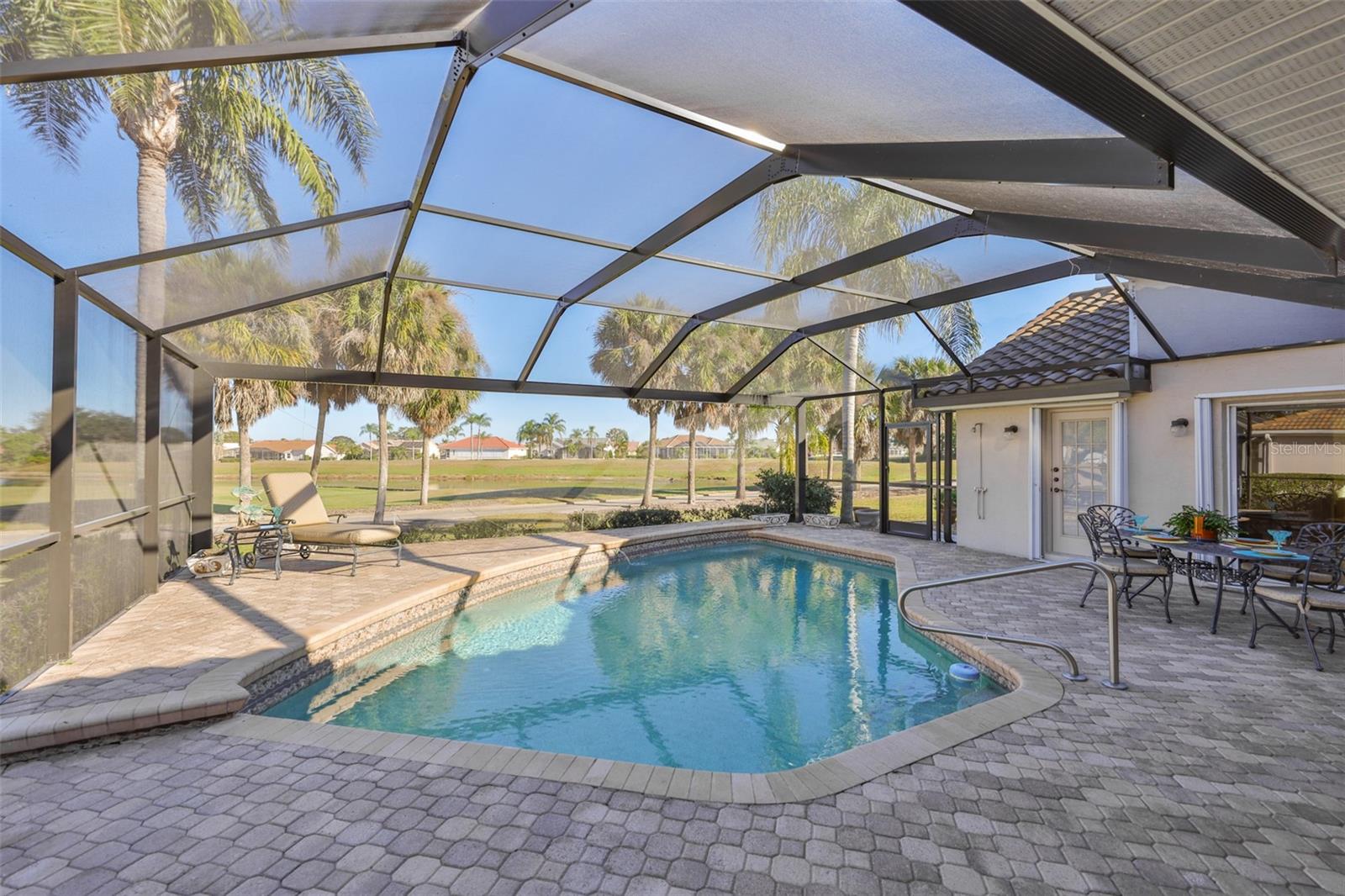 Amazing Outdoor Space, Paved, Covered, NEW FULL VIEW SCREENED POOL CAGE HURRICANE RATED