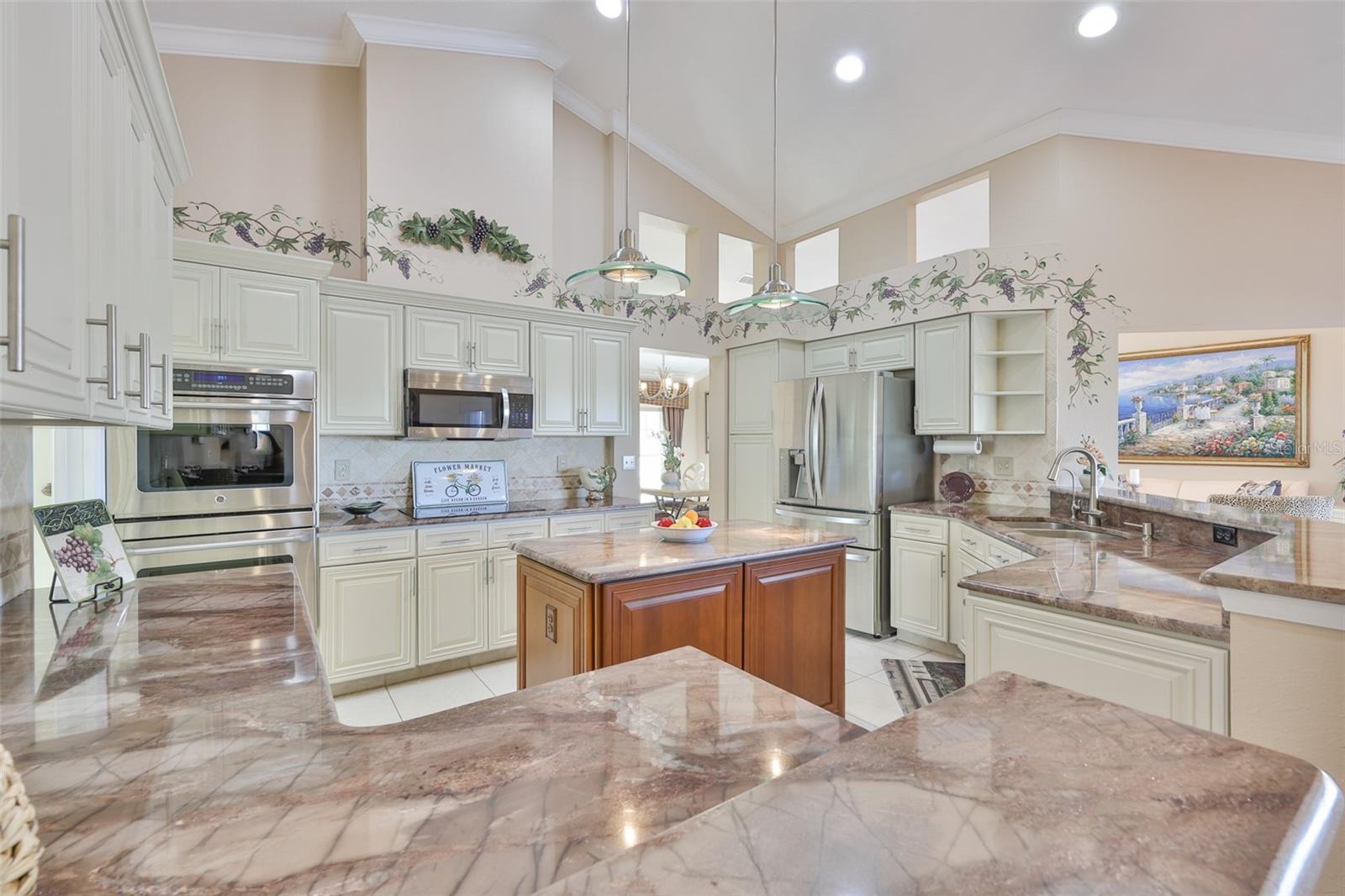 Updated Kitchen, SS Appliances, Double Wall Oven, Prep Island, Granite & Stone Back Splash