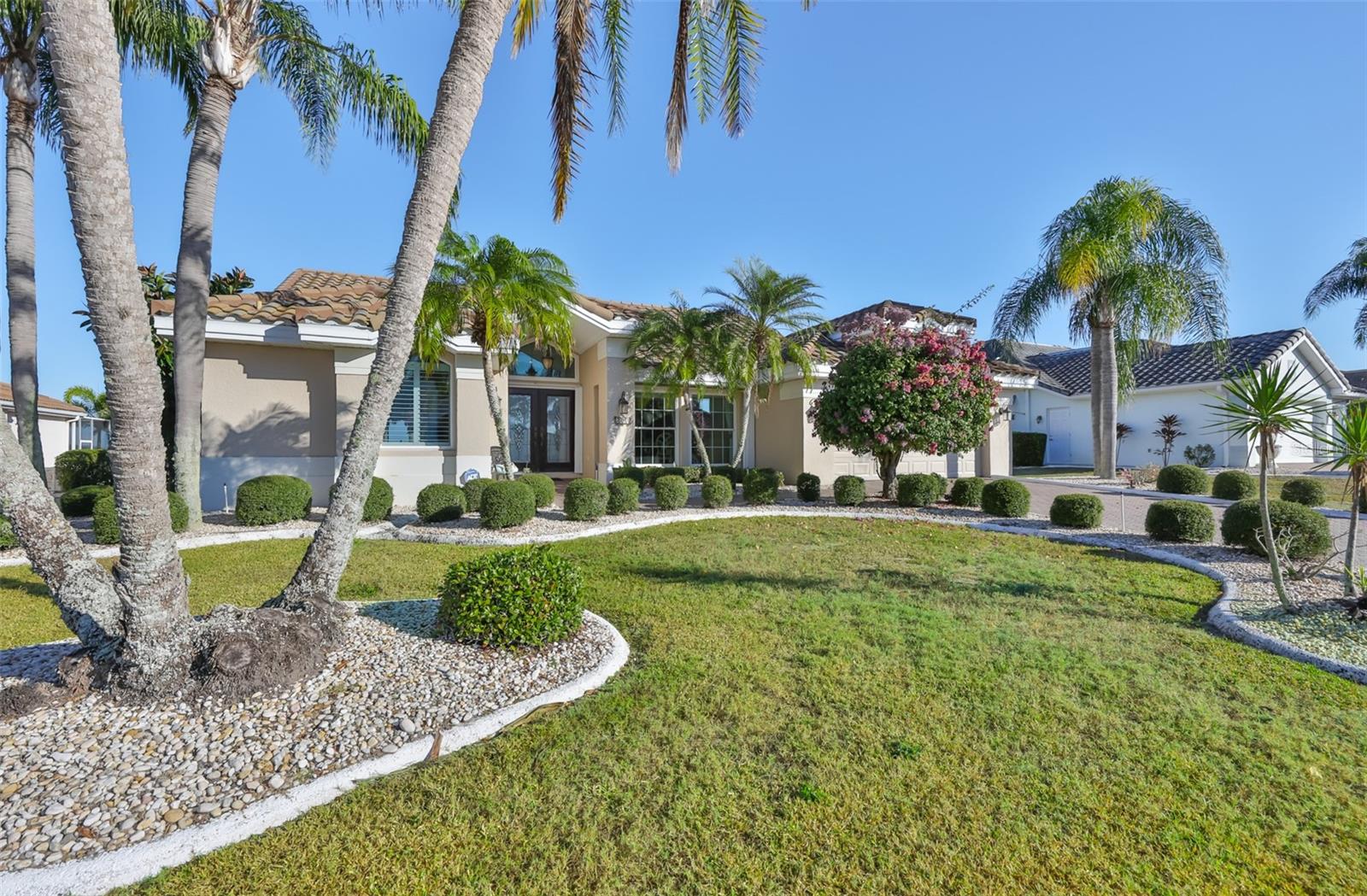 Exterior Front, Lawn Irrigation from Pond