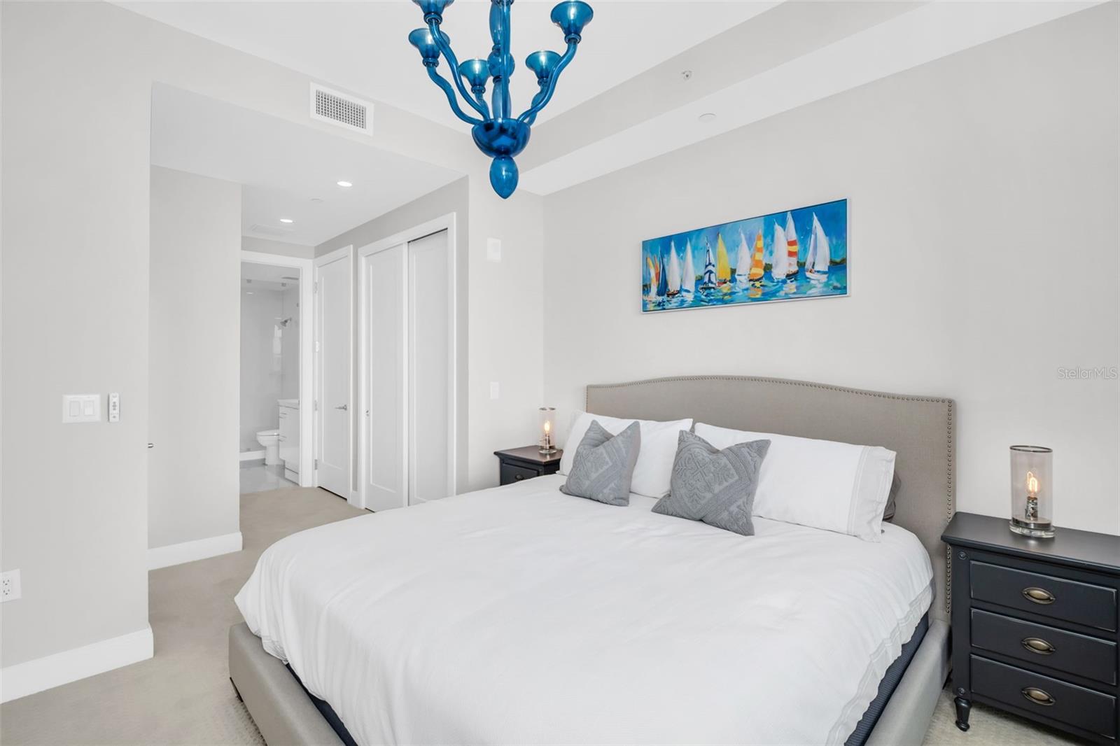 Guest bedroom with stunning water view and access to the terrace