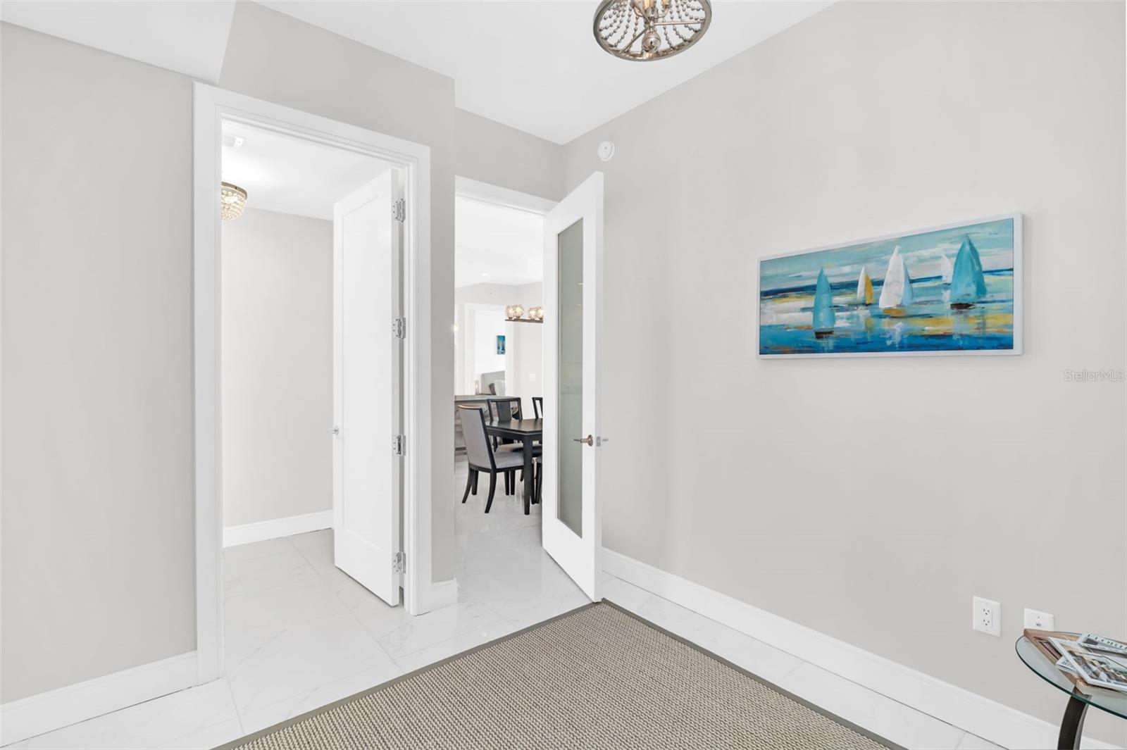 Den with adjacent powder room