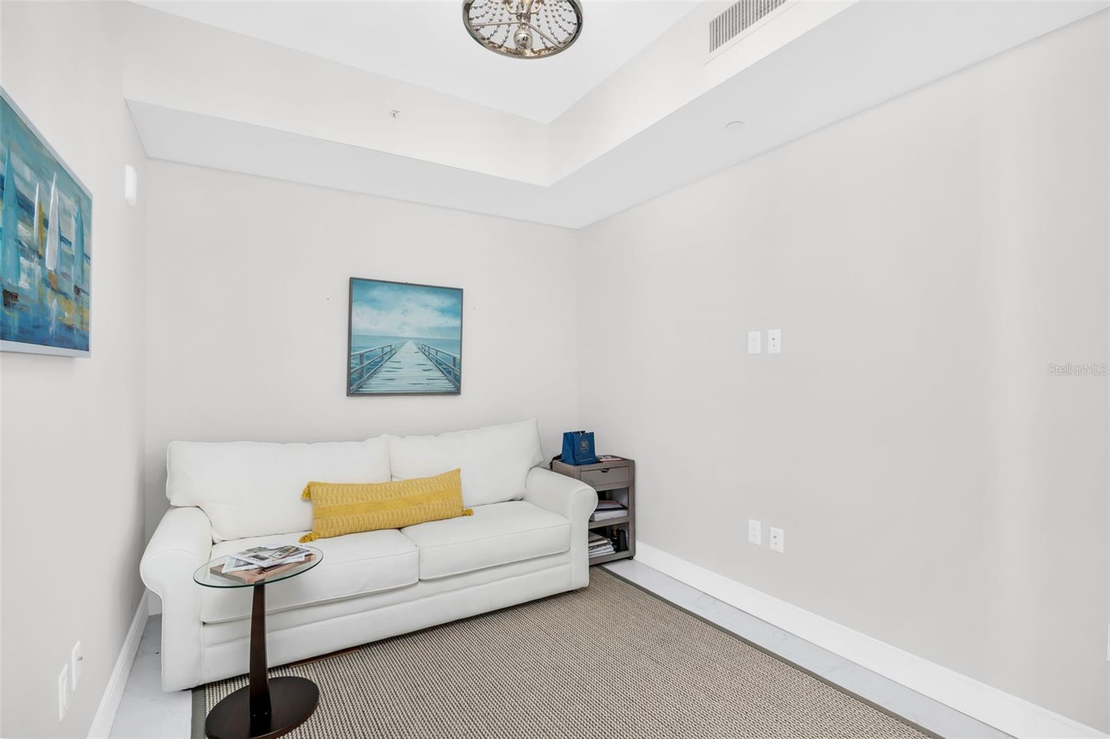 Den with adjacent powder room