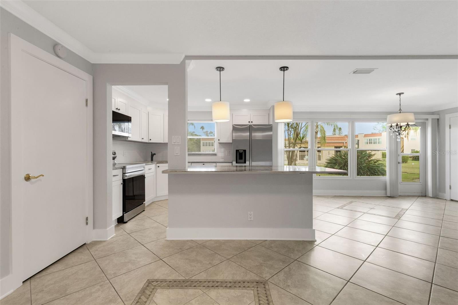 Dining Area looking to Kitchen and Florida Room