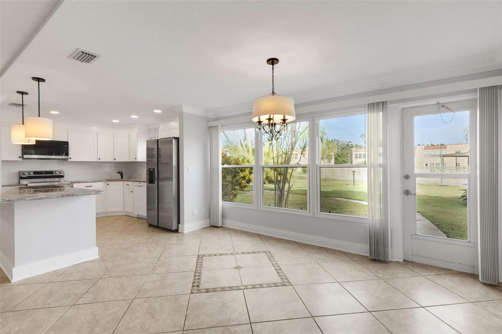 Florida Room Open to Updated Kitchen