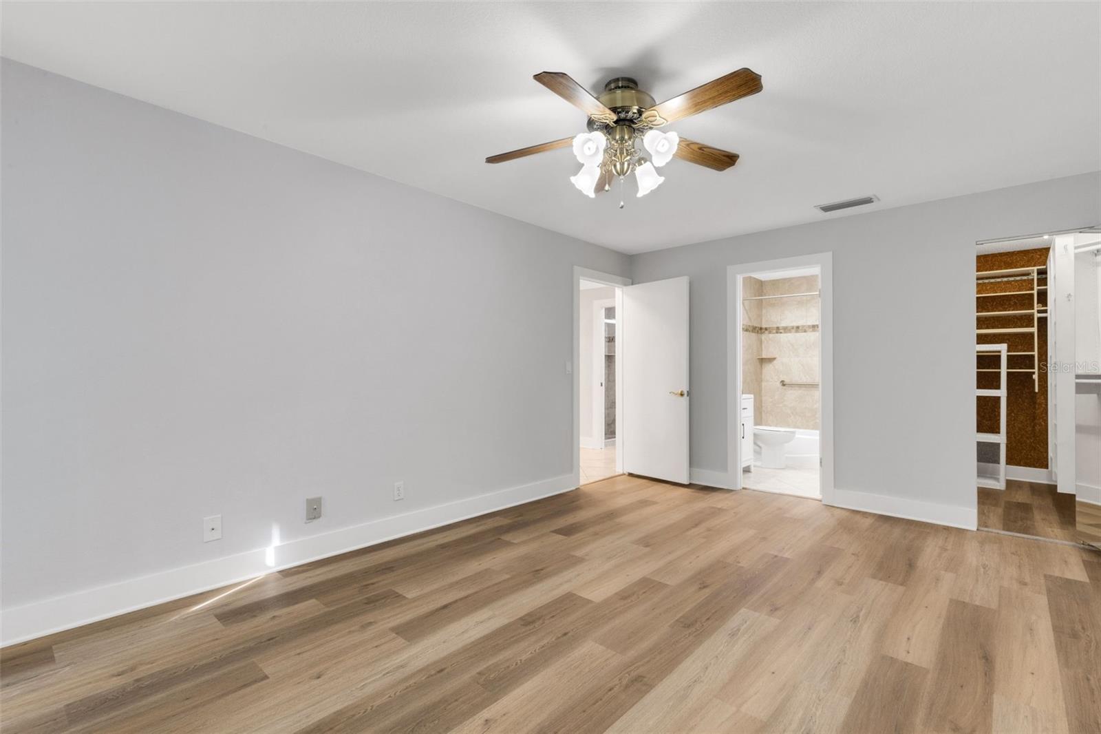 Primary Bedroom with Walk In Closet and Ensuite Primary Bath