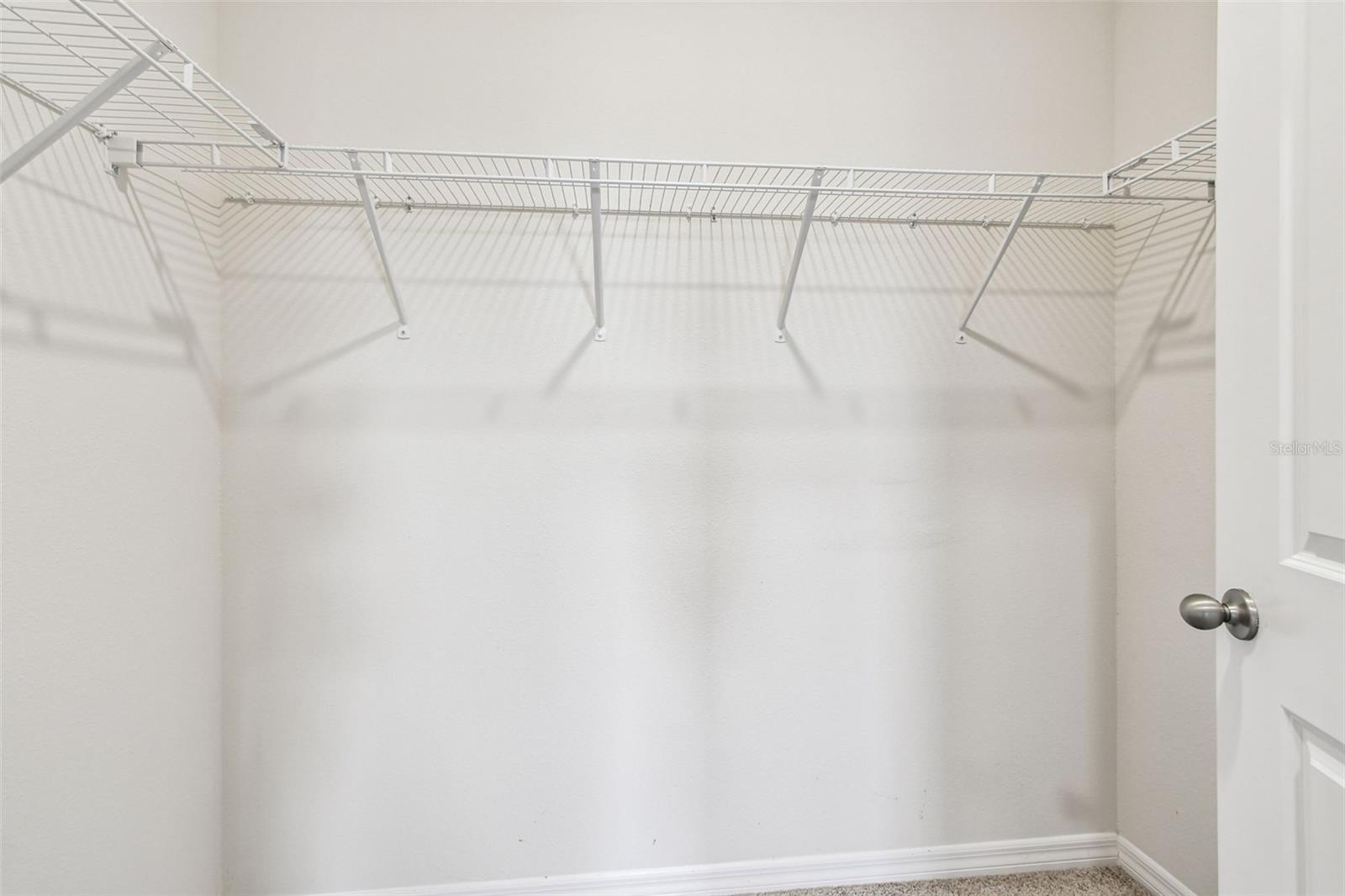 First walk-in closet in primary suite