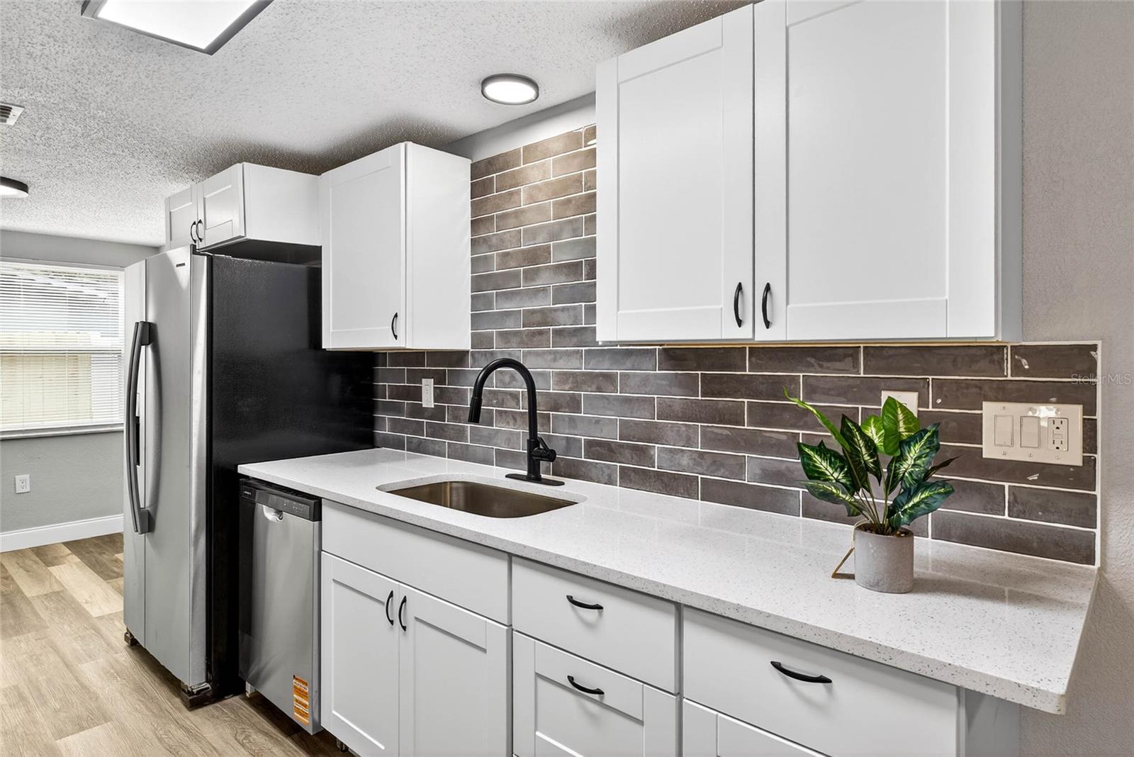 Shaker-style wood cabinets are brand new