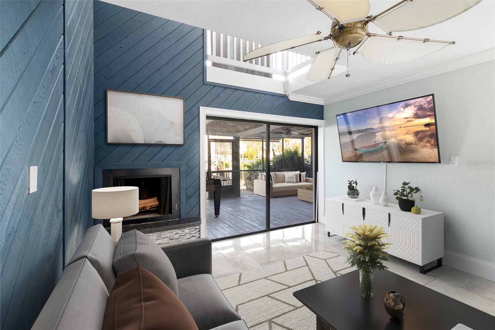 Living spaces enjoys cozy wood burning fireplace! Virtually Staged