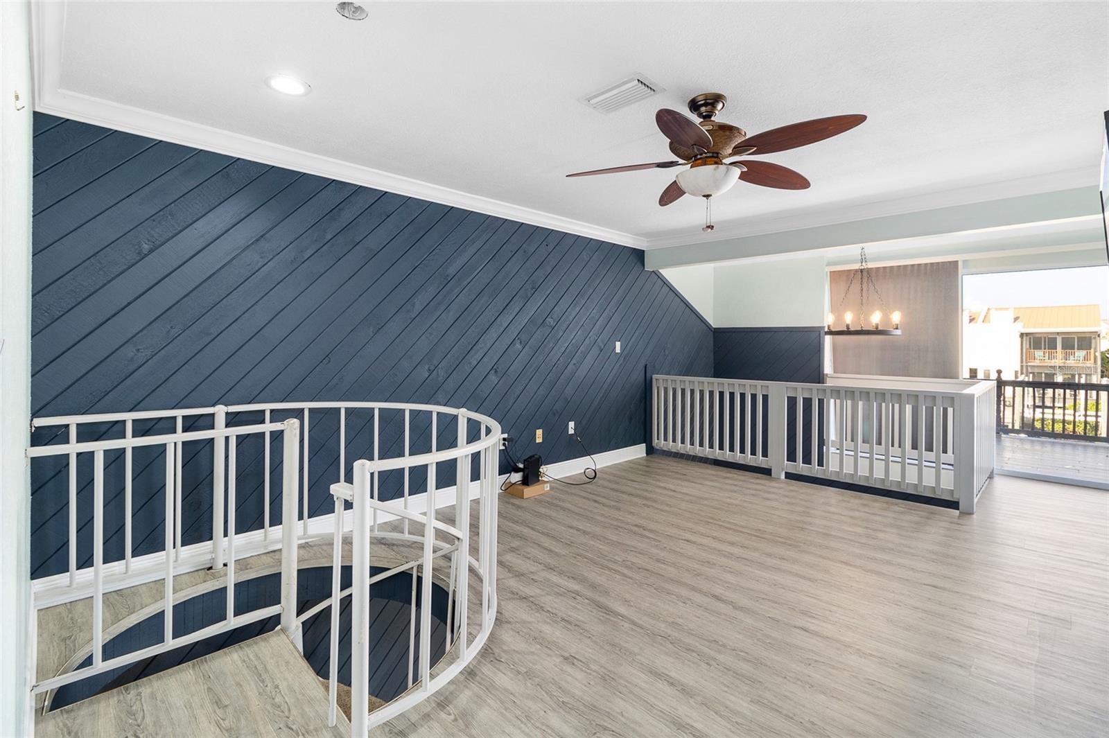 The loft space enjoys water views and access to your huge balcony!