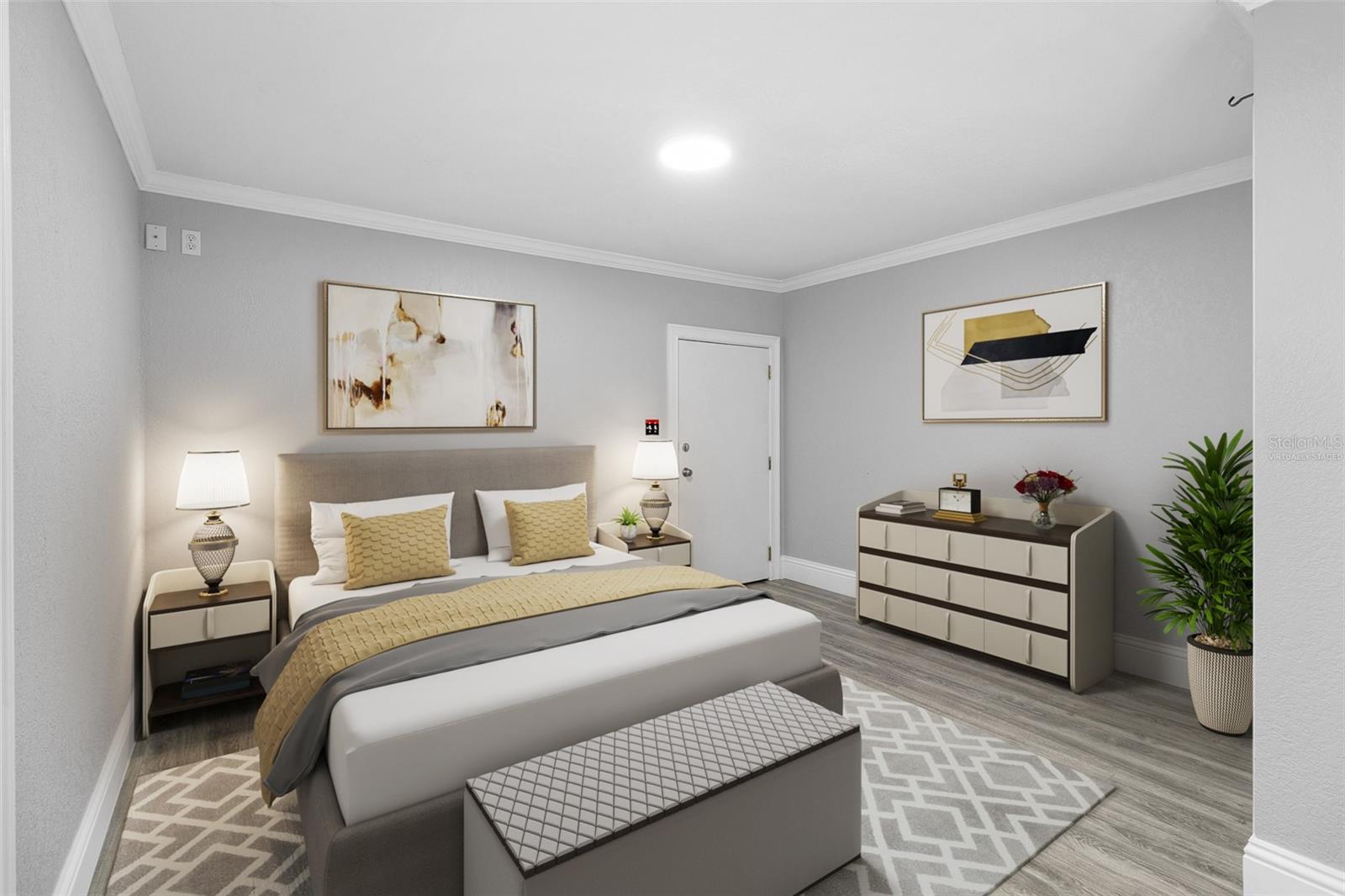 Downstairs bedroom is perfect for guests or in law visits! Virtually Staged