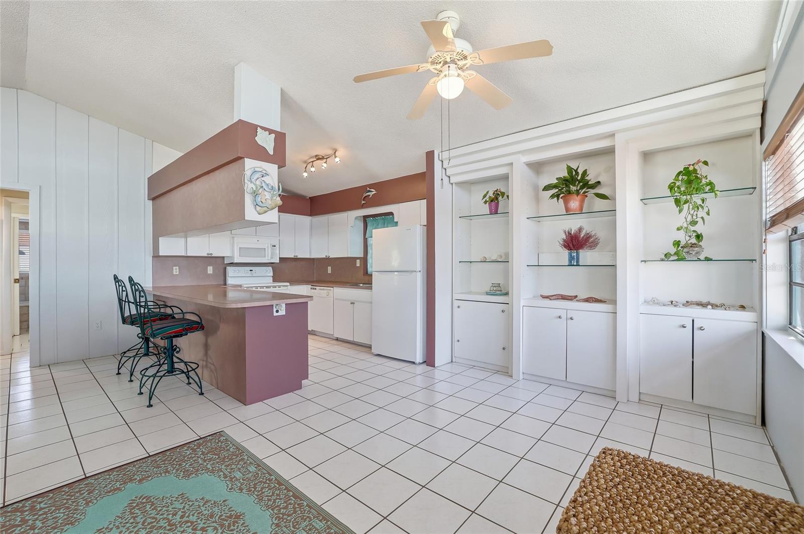 Quaint built in storage by the dining space.