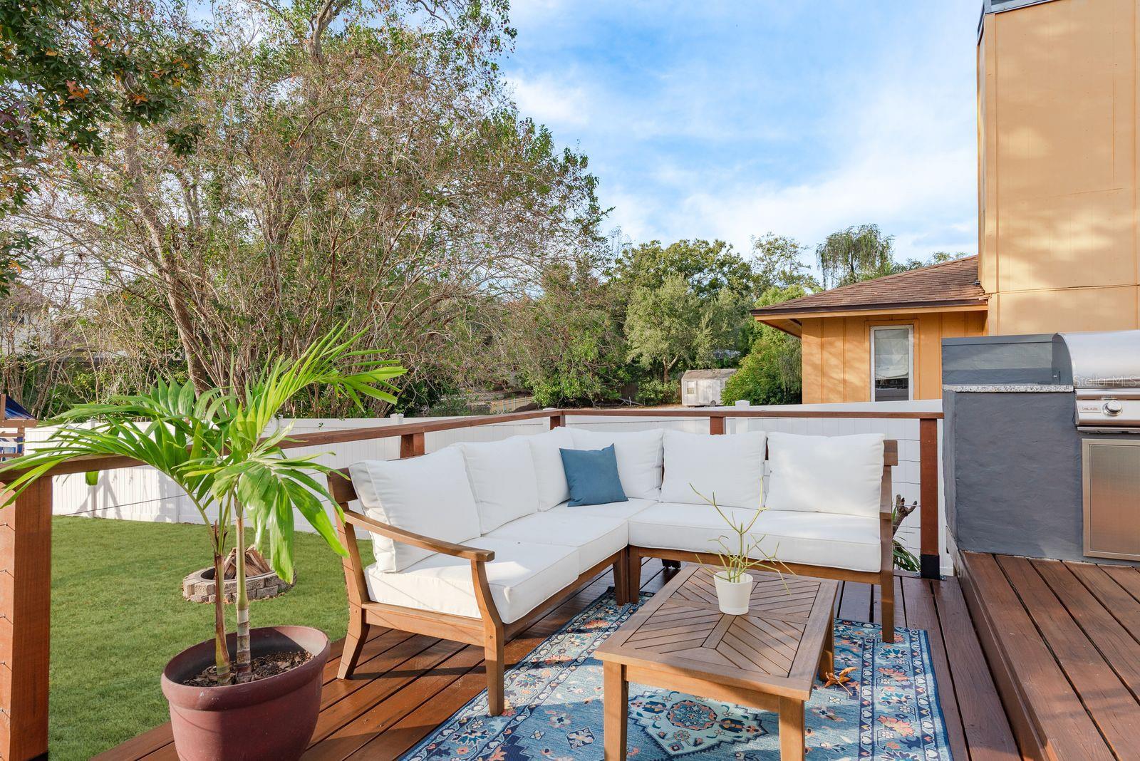 Deck with outdoor grill a