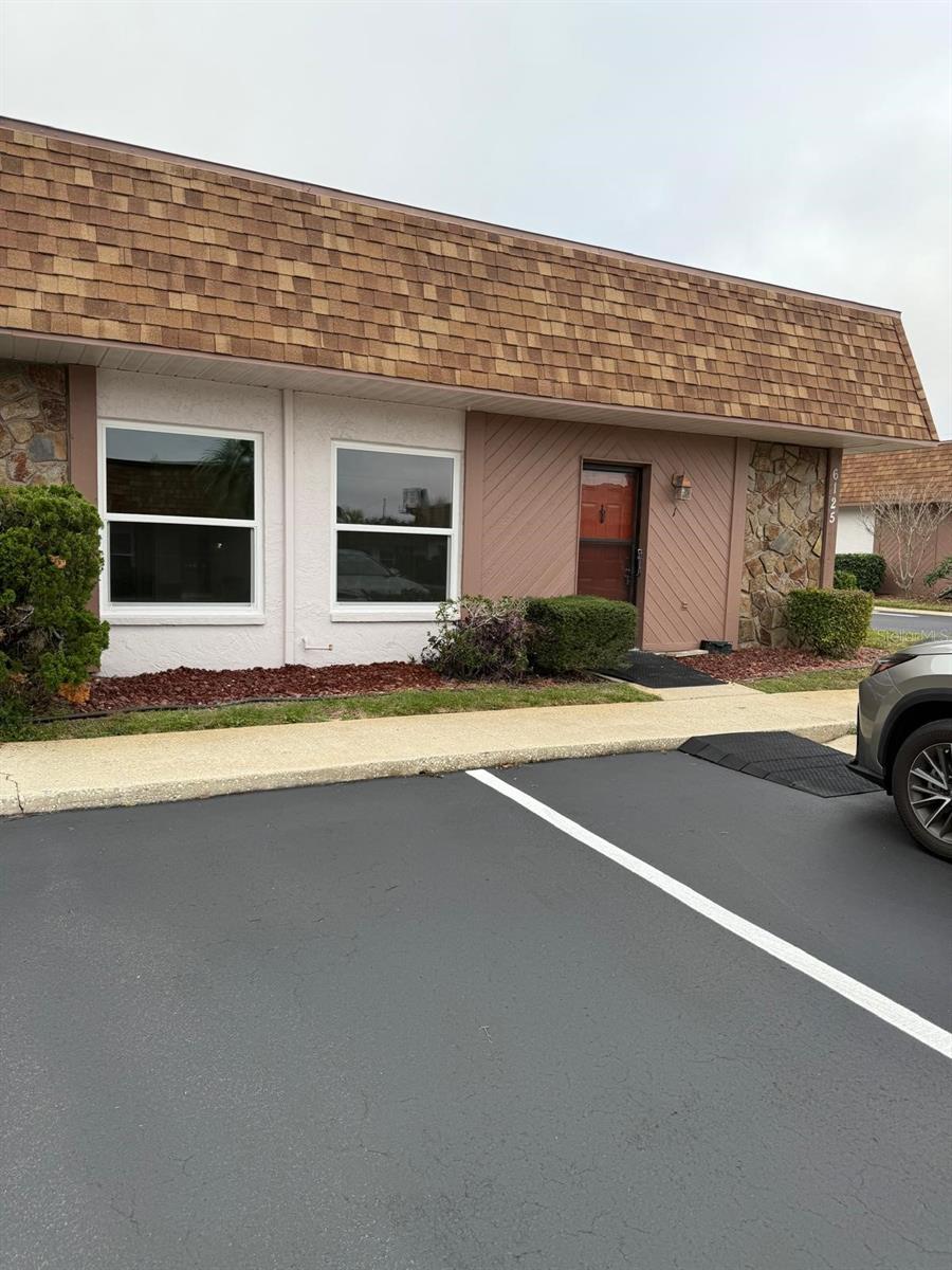 Nice curb appeal. End unit.