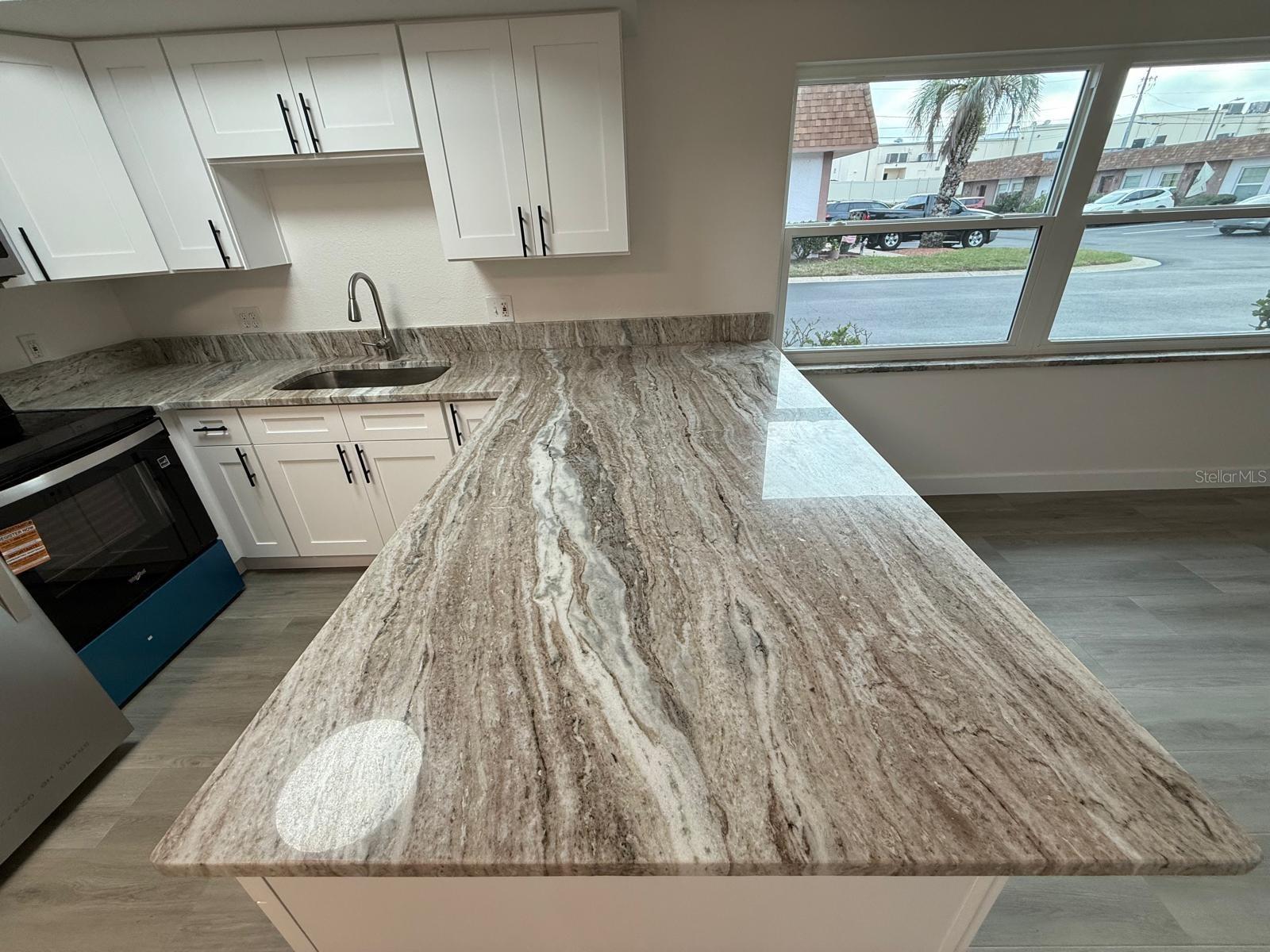 Brand new and beautiful stone countertops. WOW factor!