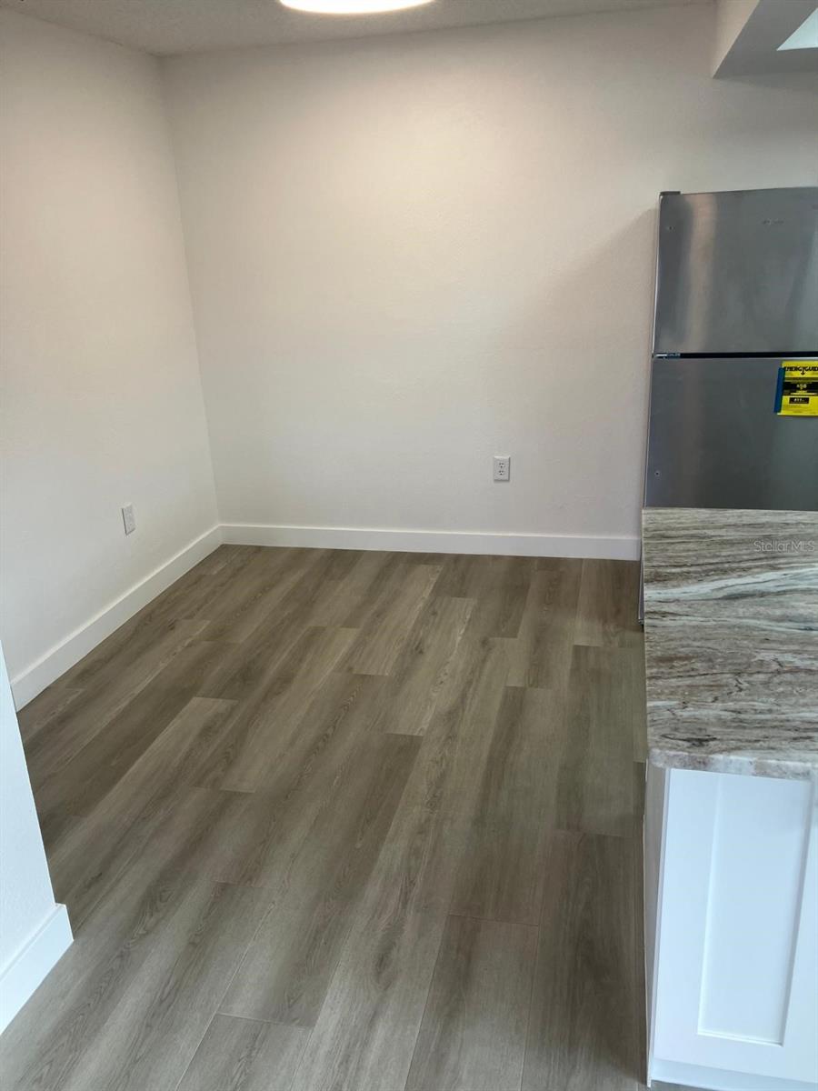 Spacious dining room located adjacent to the kitchen.  Nice layout convenient for ease of mobility.