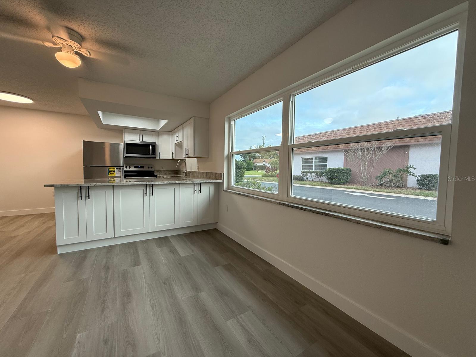 Spacious living room kitchen spaces.